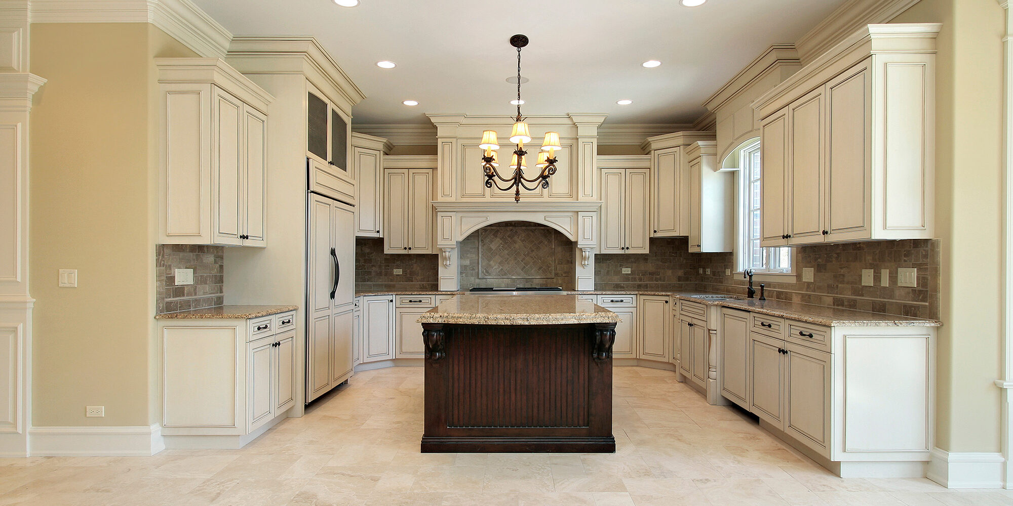 Kitchen with granite island How to Select the perfect flooring for your kitchen remodel