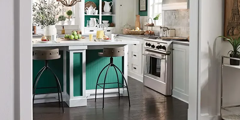 kitchen with bold colors and darker wood flooring | The Floor Store